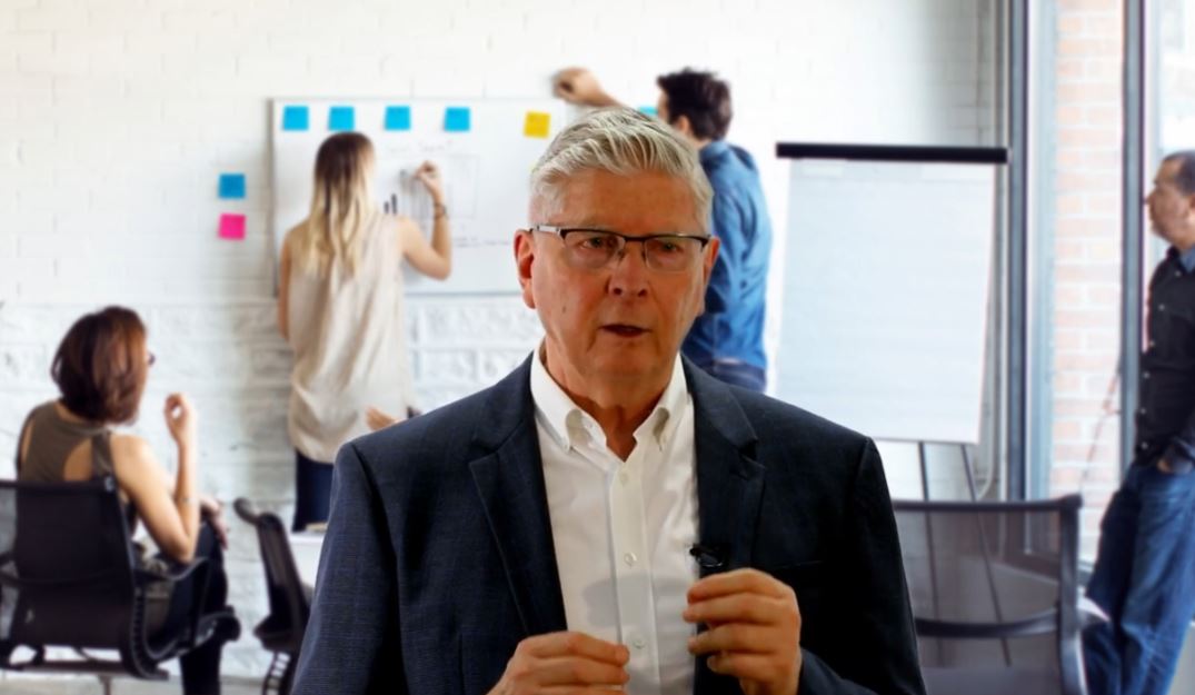 Smiling certified Harada Method trainer representing the five stages of self‑reliance program.